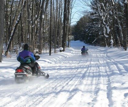 People on Snowmobiles